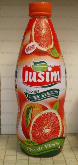 reproduction géante bouteille jus de fruits jusim